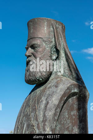 Bronze bust of orthodox pope outside St. Dionysios Church, Zakynthos, Greece Stock Photo