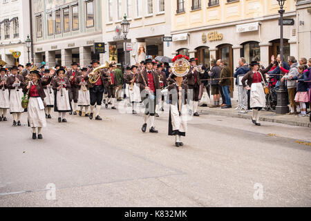 The typical dress parade at the start of the 2017 Oktoberfest winds its way through the streets of downtown Munich Stock Photo