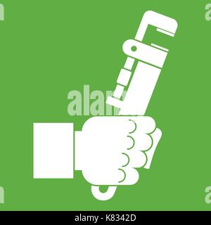 Hacksaw in man hand icon green Stock Vector