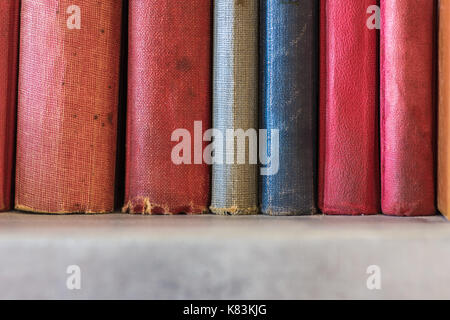 Close up of old books on a bookshelf. Stock Photo
