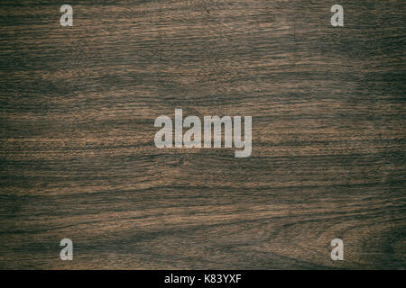 Vintage surface wood table and rustic grain texture background. Close up of dark rustic wall made of old wood table planks texture. Rustic brown wood  Stock Photo