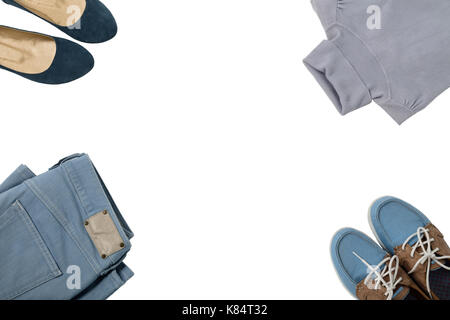 Clothes and shoes of blue color on isolated white background. Flat lay. Stock Photo
