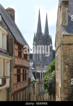 QUIMPER, FRANCE, JULY 24 2017:The quaint streets of old town Quimper and Saint-Corentin, Cathedral. Quimper is a historic town in Finistere and a popu Stock Photo
