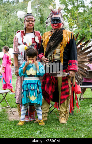 Canadian Ojibwe First Nations woman wears her traditional regalia and ...