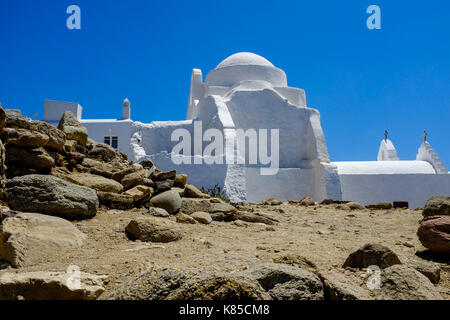 General views of Mykonos, Greece including buildings, flags and waterfront on September 56, 2017. Stock Photo