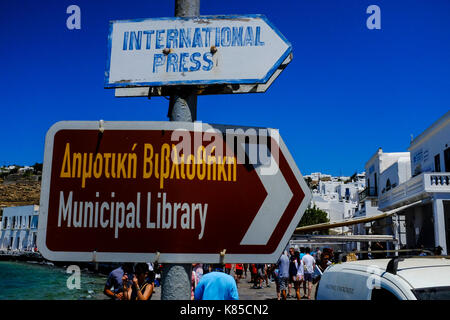 General views of Mykonos, Greece including buildings, flags and waterfront on September 56, 2017. Stock Photo