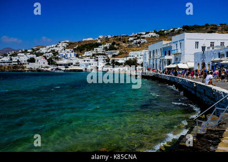 General views of Mykonos, Greece including buildings, flags and waterfront on September 56, 2017. Stock Photo