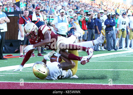 Alumni Stadium. 16th Sep, 2017. MA, USA; Boston College Eagles defensive back Lukas Denis (21) tackles Notre Dame Fighting Irish tight end Alize Mack (86) at the goal line during the second half of the NCAA football game between Notre Dame Fighting Irish and Boston College Eagles at Alumni Stadium. Notre Dame defeated Boston College 49-20. Anthony Nesmith/CSM/Alamy Live News Stock Photo