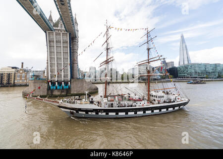 London, UK. 18th Sep, 2017. The Stavros S Niarchos, operated by the Tall Ships Youth Trust (TSYT) with young students on board sails under Tower Bridge on what may be her final visit because she has now been put up for sale. Stavros S Niarchos is primarily designed to provide young people with the opportunity to undertake voyages as character-building exercises. Credit: Vickie Flores/Alamy Live News Stock Photo