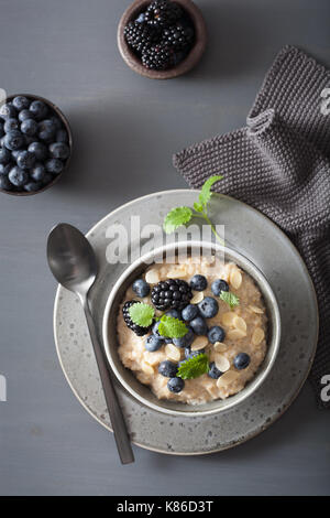 healthy breakfast steel cut oatmeal porridge with blueberry blackberry Stock Photo