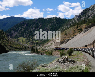 The Rocky Mountaineer passes through the Jaws of Death Gorge beside the ...