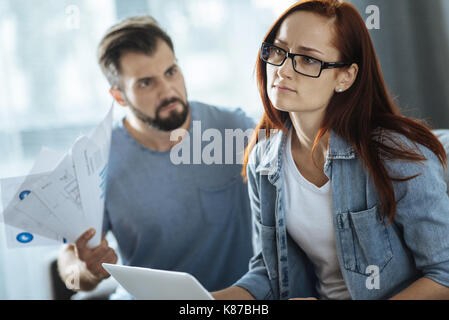 Smart unhappy woman feeling guilty Stock Photo