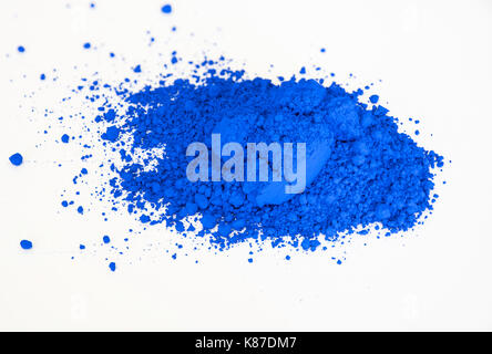 extreme close up of ultramarine deep blue pigment isolated over white background Stock Photo