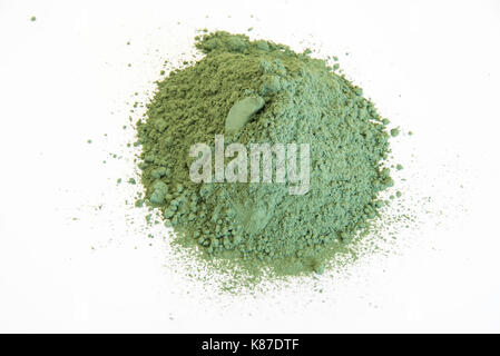 extreme close up of pigment green ground from vagone isolated over white background Stock Photo