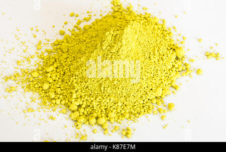 extreme close up of gold pigment isolated over white background Stock ...