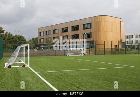 An artificial grass all-weather football pitch at a new secondary school in Slough, UK Stock Photo