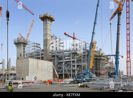 A new Energy from Waste power station under construction near Sittingbourne, Kent, UK. Shows construction of concrete walls and steel frame. Stock Photo