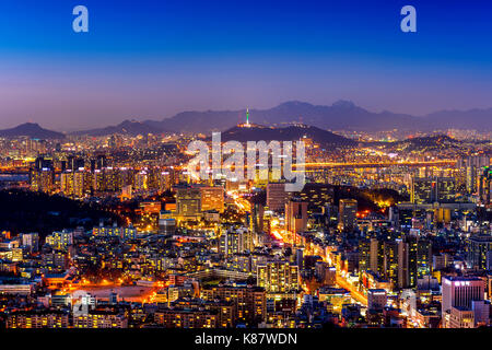 Seoul cityscape and Seoul tower at night. Traffic in Seoul, South Korea. Stock Photo