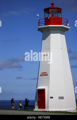 The lighthouse at Cape George, one of many place along the shoreline in Nova Scotia, Canada. Stock Photo