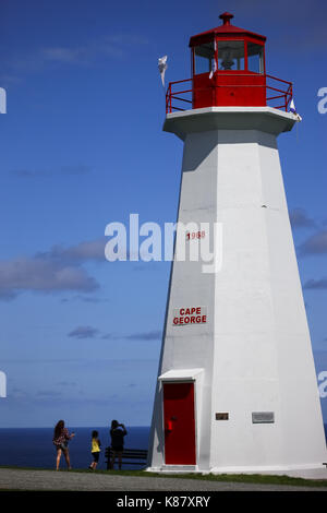 The lighthouse at Cape George, one of many place along the shoreline in Nova Scotia, Canada. Stock Photo