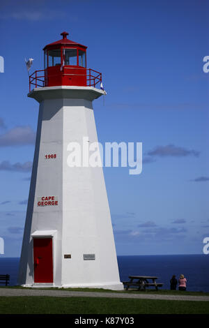 The lighthouse at Cape George, one of many place along the shoreline in Nova Scotia, Canada. Stock Photo