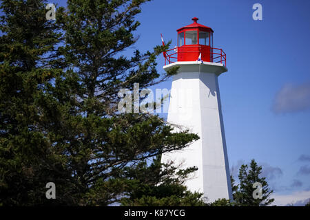 The lighthouse at Cape George, one of many place along the shoreline in Nova Scotia, Canada. Stock Photo