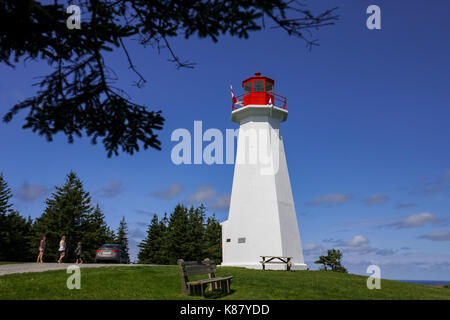 The lighthouse at Cape George, one of many place along the shoreline in Nova Scotia, Canada. Stock Photo