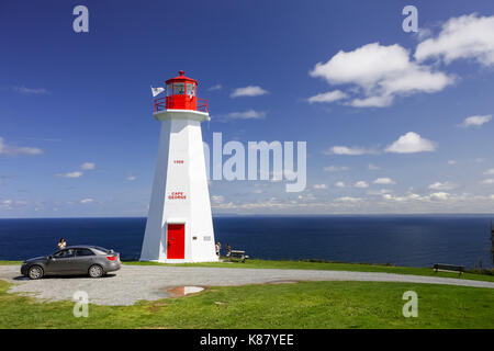 The lighthouse at Cape George, one of many place along the shoreline in Nova Scotia, Canada. Stock Photo