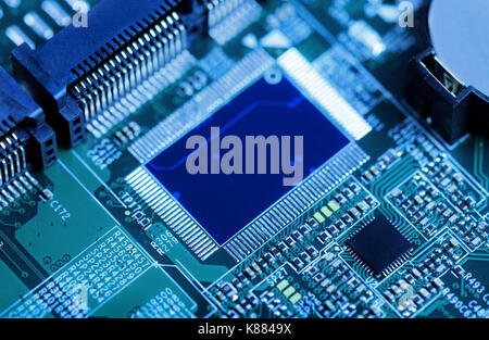technology background circuit board toned in blue Stock Photo