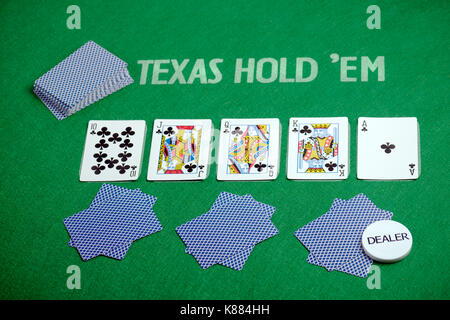 Poker cards on green poker cloth. Texas Hold'em Stock Photo