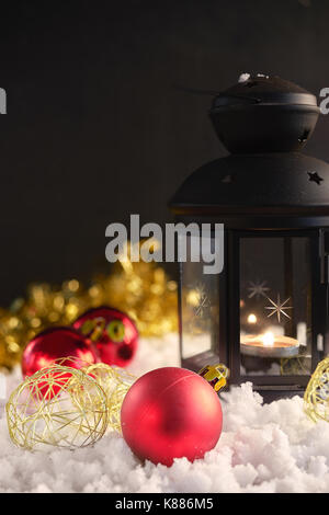 Christmas decoration and latern with burning candle Stock Photo