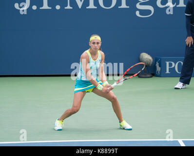 New York, NY USA - August 28, 2017: Aleksandra Krunic of Serbia returns ball during US Open Championships day 1 match against Johanna Konta of Great Britain at Billie Jean King Tennis center Stock Photo