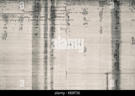 Corroded and moisture infiltraded formed concrete big wall Stock Photo