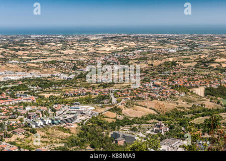 View over parts of San Marino, the Emilia-Romagna region of Italy and the Adriatic coast from the summit of Mount Titan (Monte Titano) in San Marino. Stock Photo