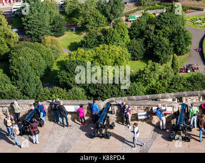 Tourists at Battlements of Edinburgh Castle, with view of Princess Street Gardens, and New Town, Edinburgh, Scotland Stock Photo