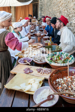 San Marinis dressed in period costumes during the annual Medieval Days Festival held in the old town of San Marino in the republic of San Marino. Stock Photo