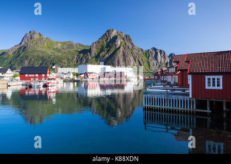 Henningsvaer, Norway - August 19,2017: Picturesque fishing port in Henningsvaer on Lofoten islands, Norway with typical red wooden buildings and small Stock Photo