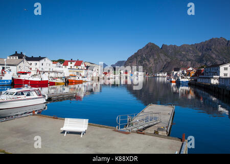 Henningsvaer, Norway - August 19,2017: Picturesque fishing port in Henningsvaer on Lofoten islands, Norway with typical red wooden buildings and small Stock Photo