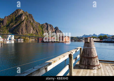 Henningsvaer, Norway - August 19,2017: Picturesque fishing port in Henningsvaer on Lofoten islands, Norway with typical red wooden buildings and small Stock Photo