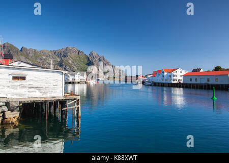 Henningsvaer, Norway - August 19,2017: Picturesque fishing port in Henningsvaer on Lofoten islands, Norway with typical red wooden buildings and small Stock Photo