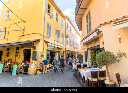 Antibes, France - July 01, 2016: day view of typical street in Antibes, France. Antibes is a popular seaside town in the heart of the Cote d'Azur. Stock Photo