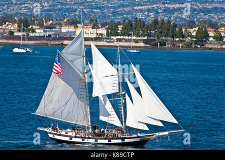 Tall Sailing Ship Anazing Grace under full sail in San Diego Harbor, CA US.  Amazing Grace is a 83' topsail schooner based out of Gig Harbor, Washingt Stock Photo