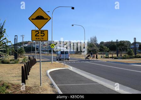 People crossing street at a zebra crossing in Coffs Harbour, New South Wales, Australia Stock Photo