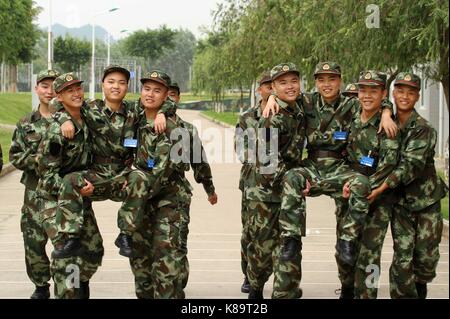Chongzuo, Chongzuo, China. 16th Sep, 2017. Chongzuo, CHINA-16th September 2017: (EDITORIAL USE ONLY. CHINA OUT).Lin Mingzong and Lin Mingyao are 18-year-old twins soldiers in Chongzuo, southwest China's Guangxi. The twins, born in Quanzhou, southeast China's Fujian Province, entered the army this September. Credit: SIPA Asia/ZUMA Wire/Alamy Live News Stock Photo