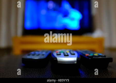 Three remote control devices Stock Photo