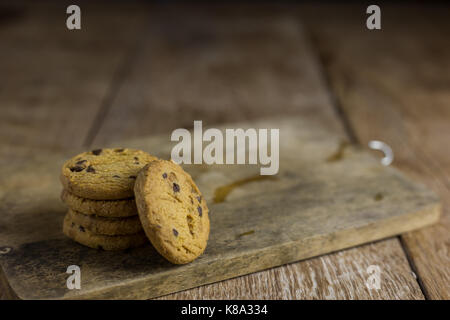 Chocolate cookies on wooden table Stock Photo