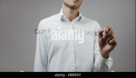 Computer network, Man Writing on Glass Stock Photo