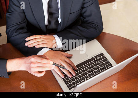 Business people are working on laptop Stock Photo