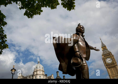 The statue to Liberal politician David Lloyd George which stands in Parliament Square, below the Elizabeth Tower and the Houses of Parliament, on 12th September 2017, in London, England. David Lloyd George 1st Earl Lloyd-George of Dwyfor was a British Liberal politician and statesman. The statue of former British Prime Minister David Lloyd George is by Glynn Williams is located at Parliament Square in London and stands 8 feet (2.4 m) tall. Unveiled in October 2007 it was funded by the David Lloyd George Statue Appeal, a charitable trust supported in part by HRH The Prince of Wales. Stock Photo