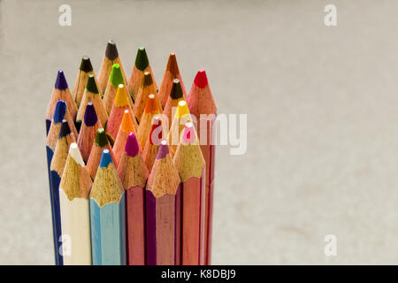 Different Colour Pencils with Grey Background Stock Photo